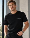 Essential Logo Tee Black Men detail — CORLIÉN & KAEL